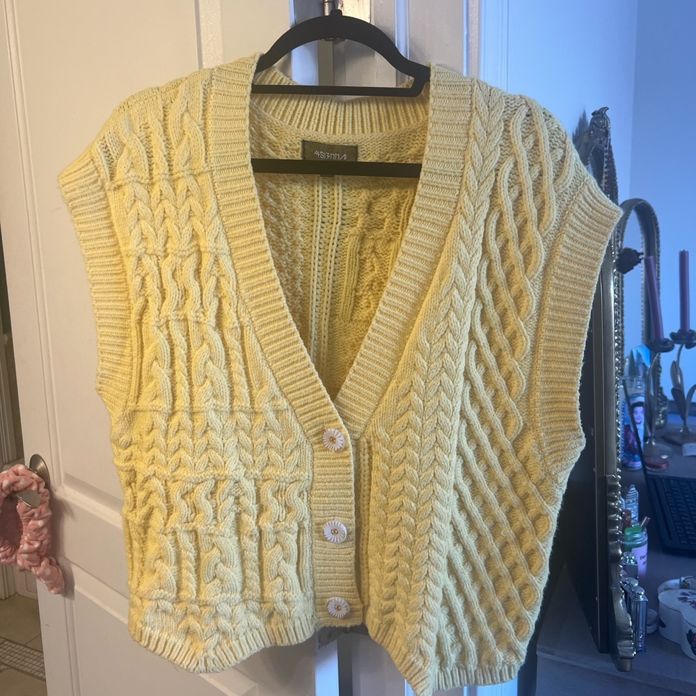 Yellow sweater vest